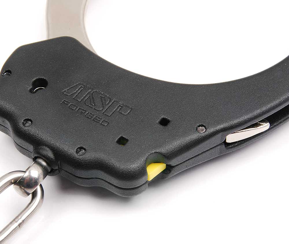 Close-up of the ASP legcuff lock body with double lock slide and swivel
