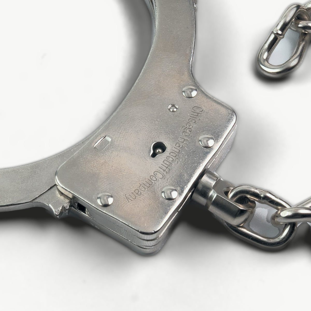 Close-up of the neck collar's double-lock housing with keyhole