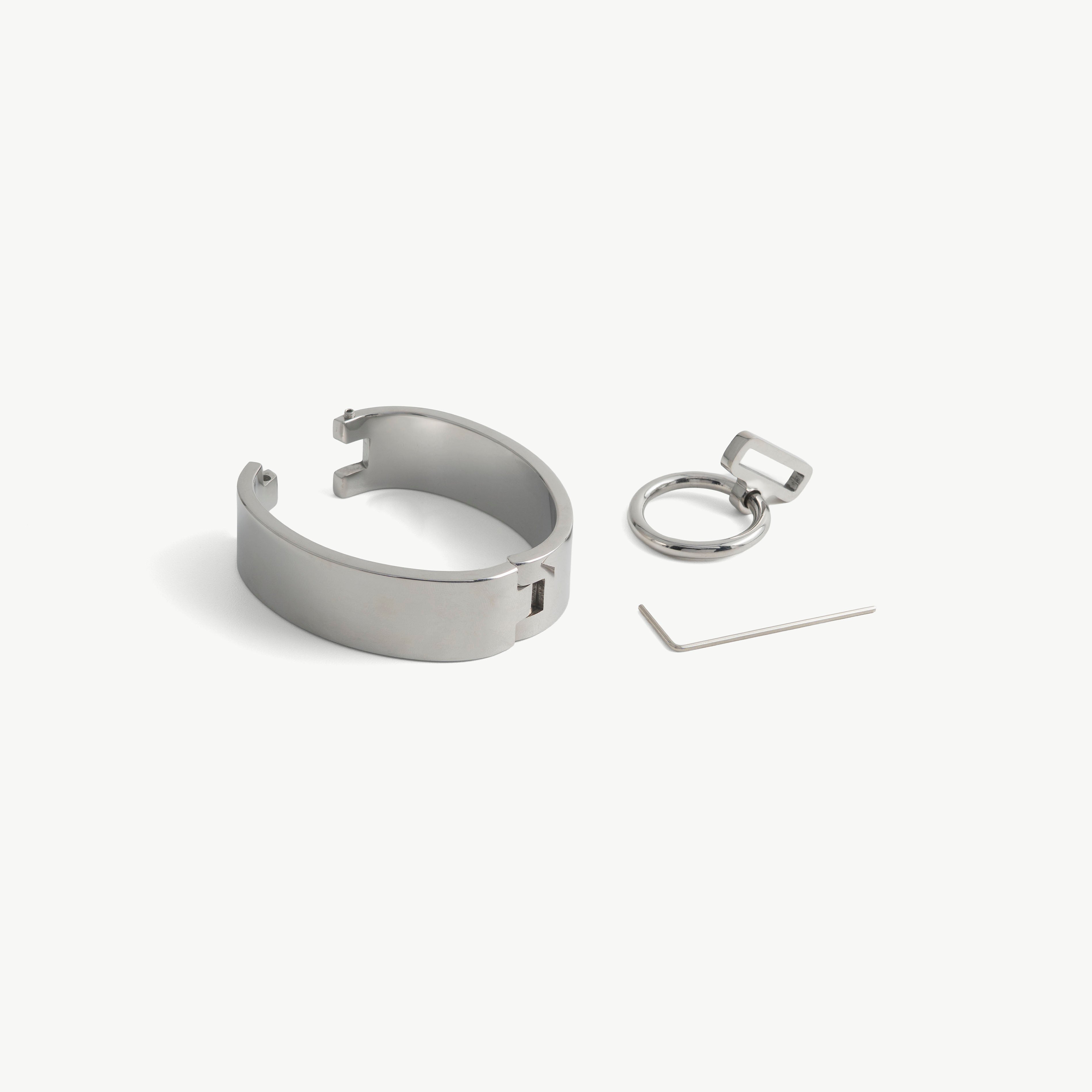 deSade silver wrist bracelet shown open beside its hex key tool