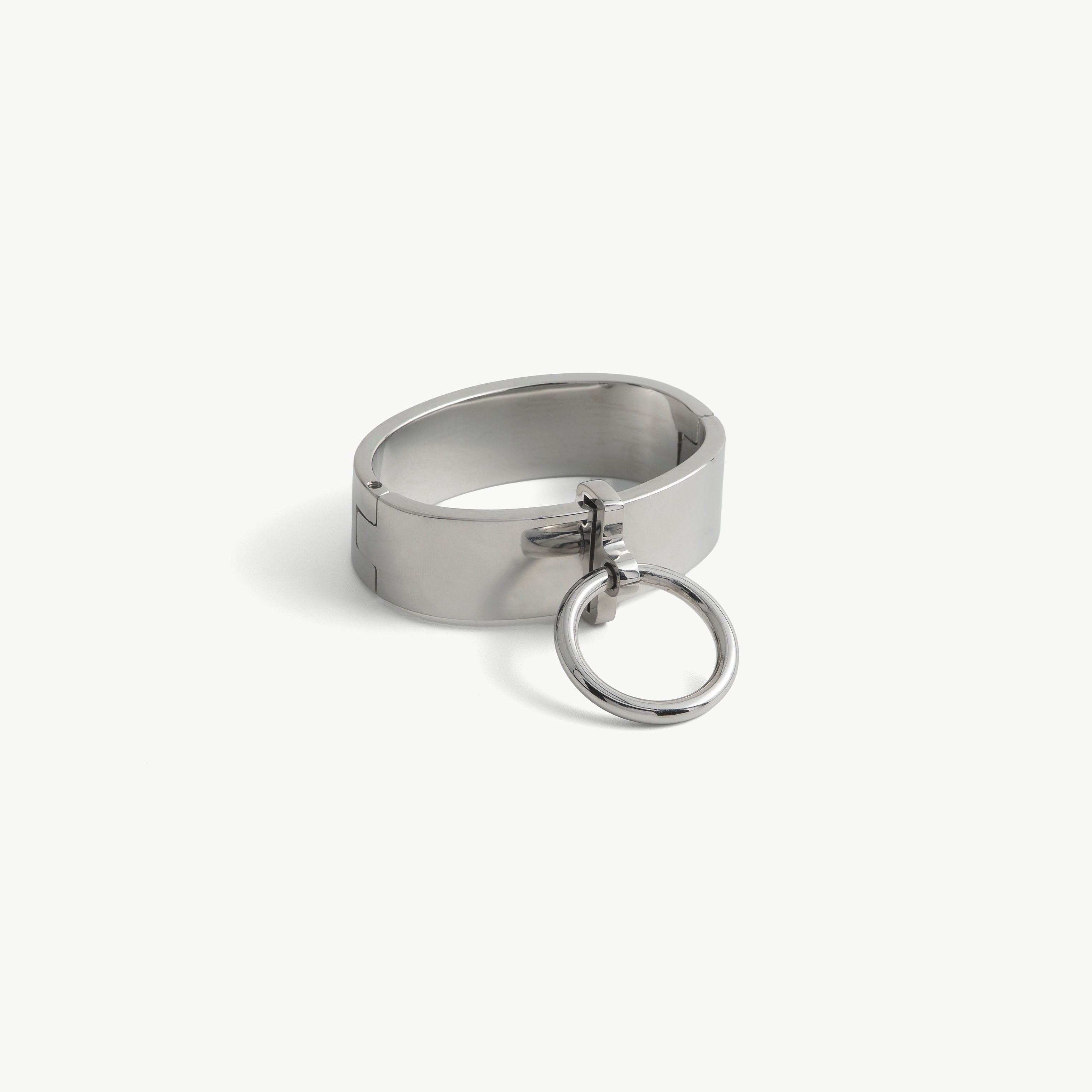 Age of Bondage deSade silver wrist bracelet, 20mm band with hidden hex lock and front O-ring