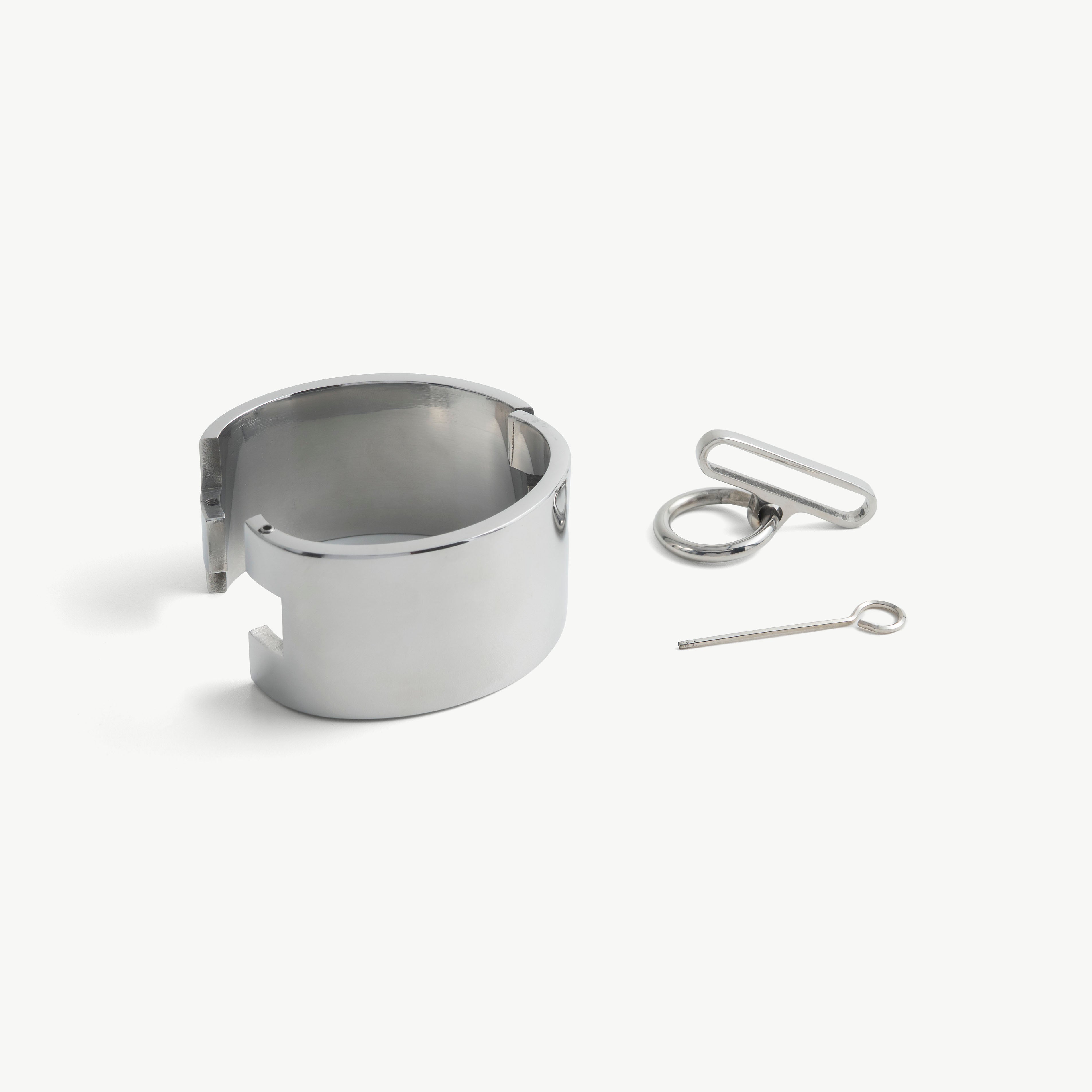 Open polished steel deSade wrist band with detachable O-ring fitting and locking pin