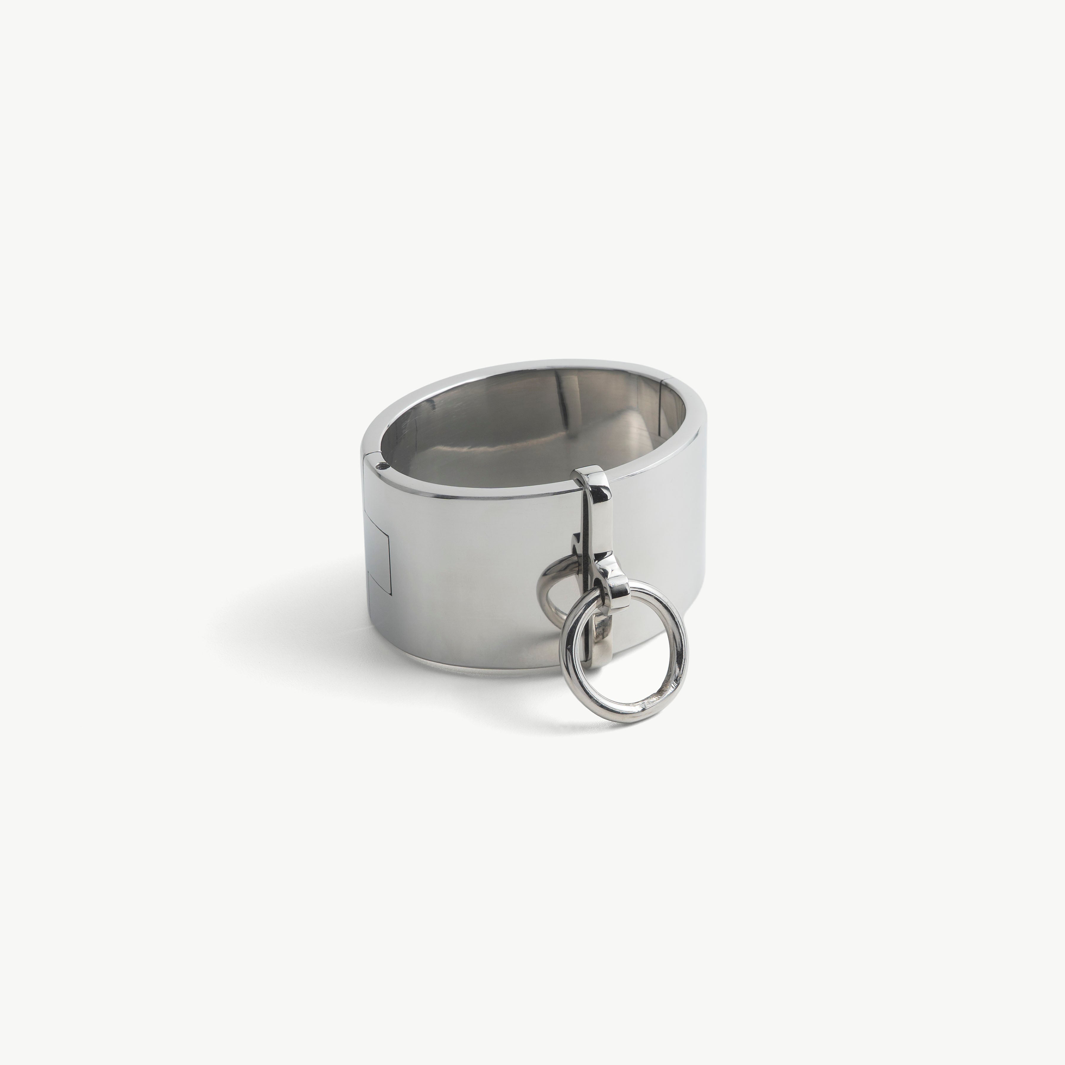 Age of Bondage deSade wrist band in polished steel, wide 40mm locking cuff with hanging O-ring