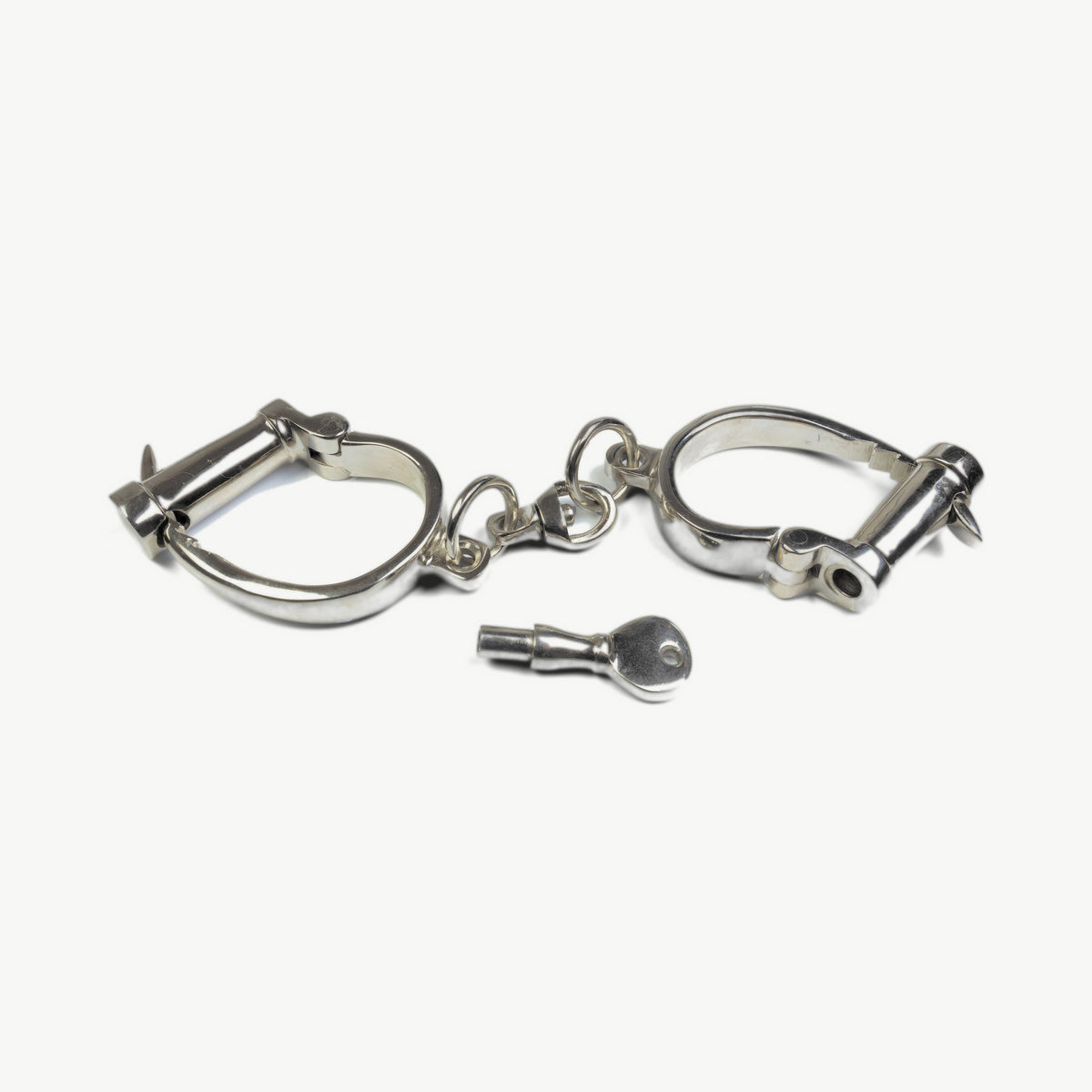 KUB 121 Darby-style handcuffs with their screw key