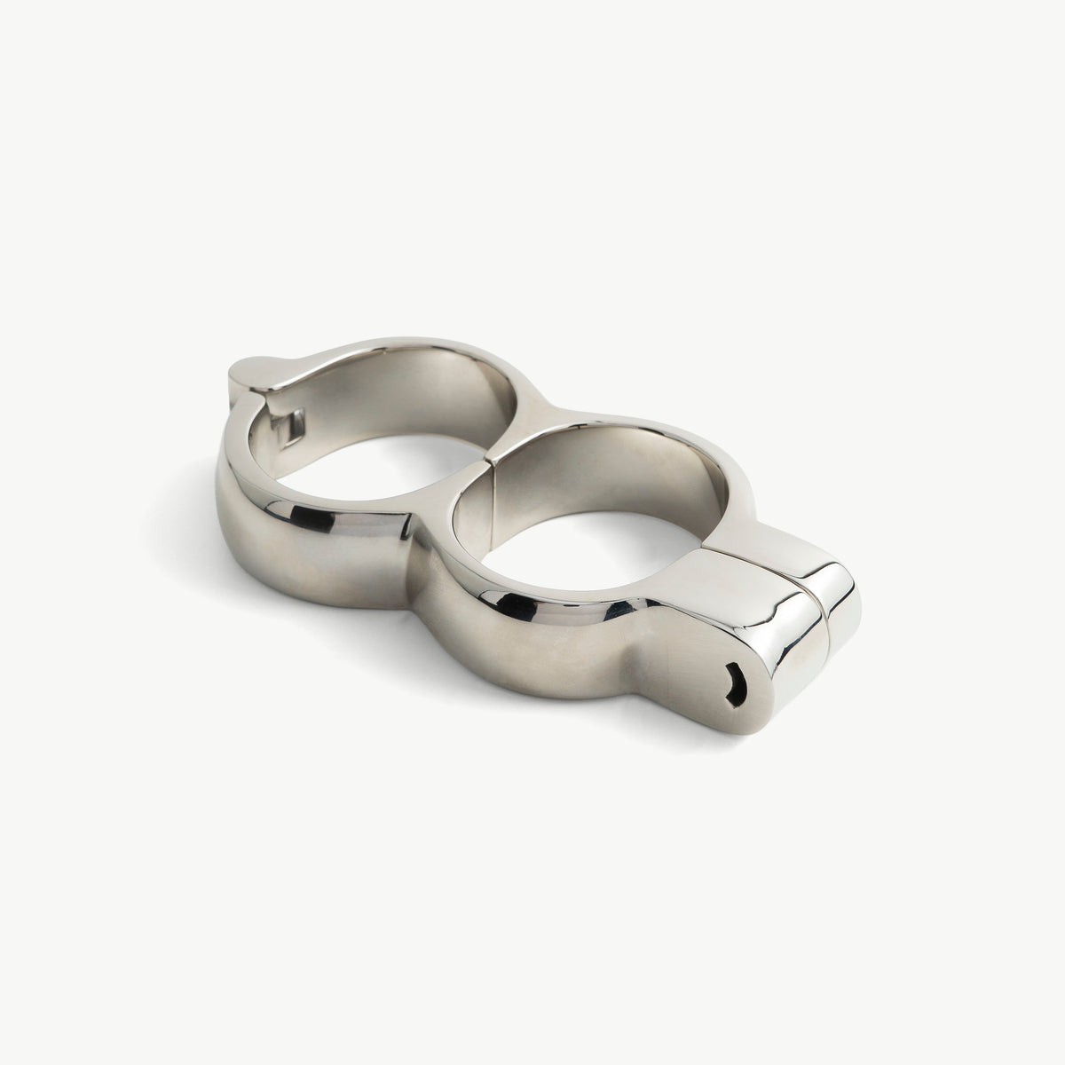Age of Bondage Irish 8 rigid heavy handcuffs in polished steel, angled view