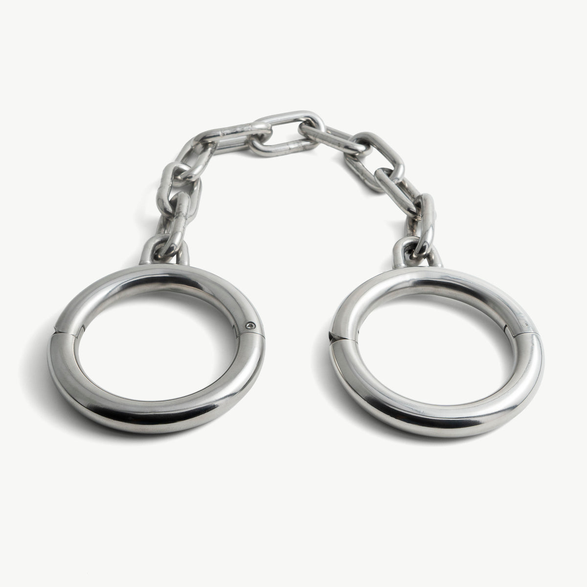 Super heavy stainless steel legcuffs with chain, front view