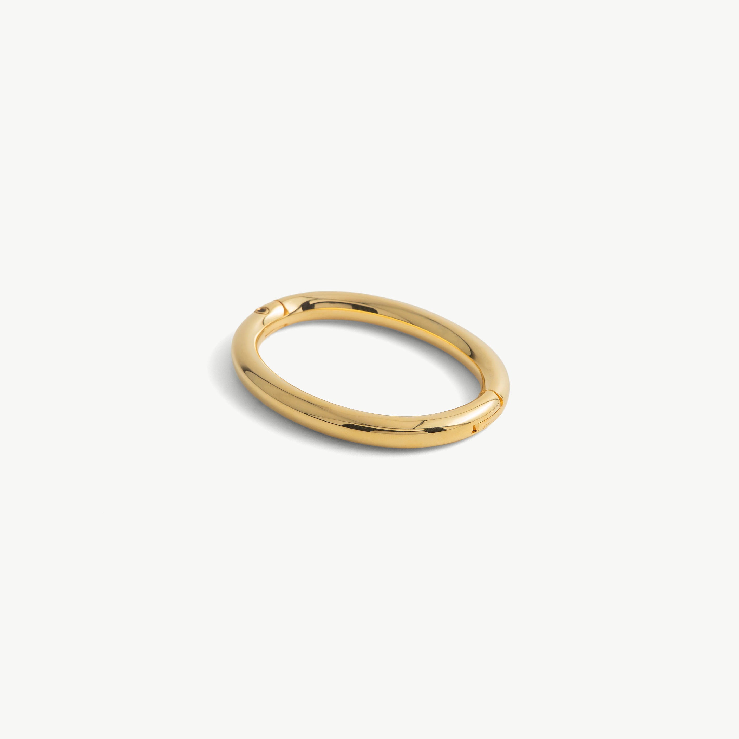 Age of Bondage deSade gold wrist bracelet, smooth oval band with hidden hex lock, 8mm steel