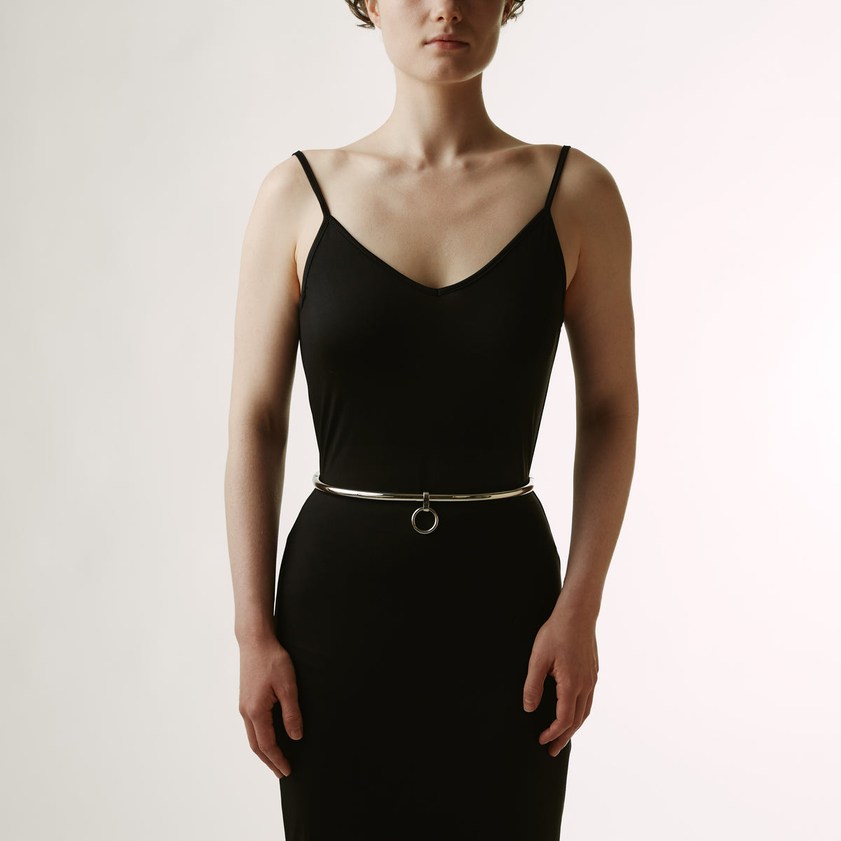 Steel waist restraint belt worn at the waist, front view with the hanging O-ring