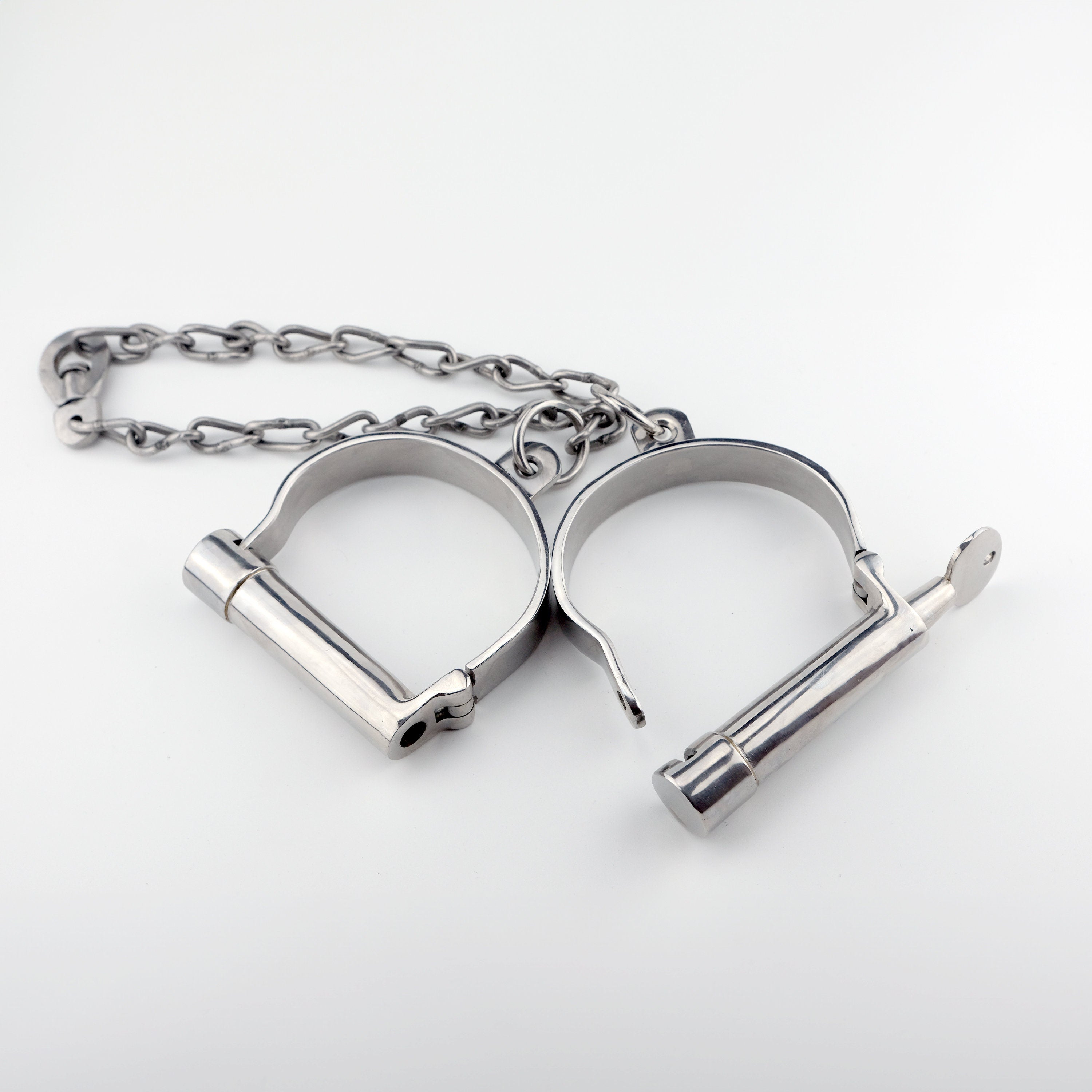 Heavy darby style stainless steel leg irons with chain