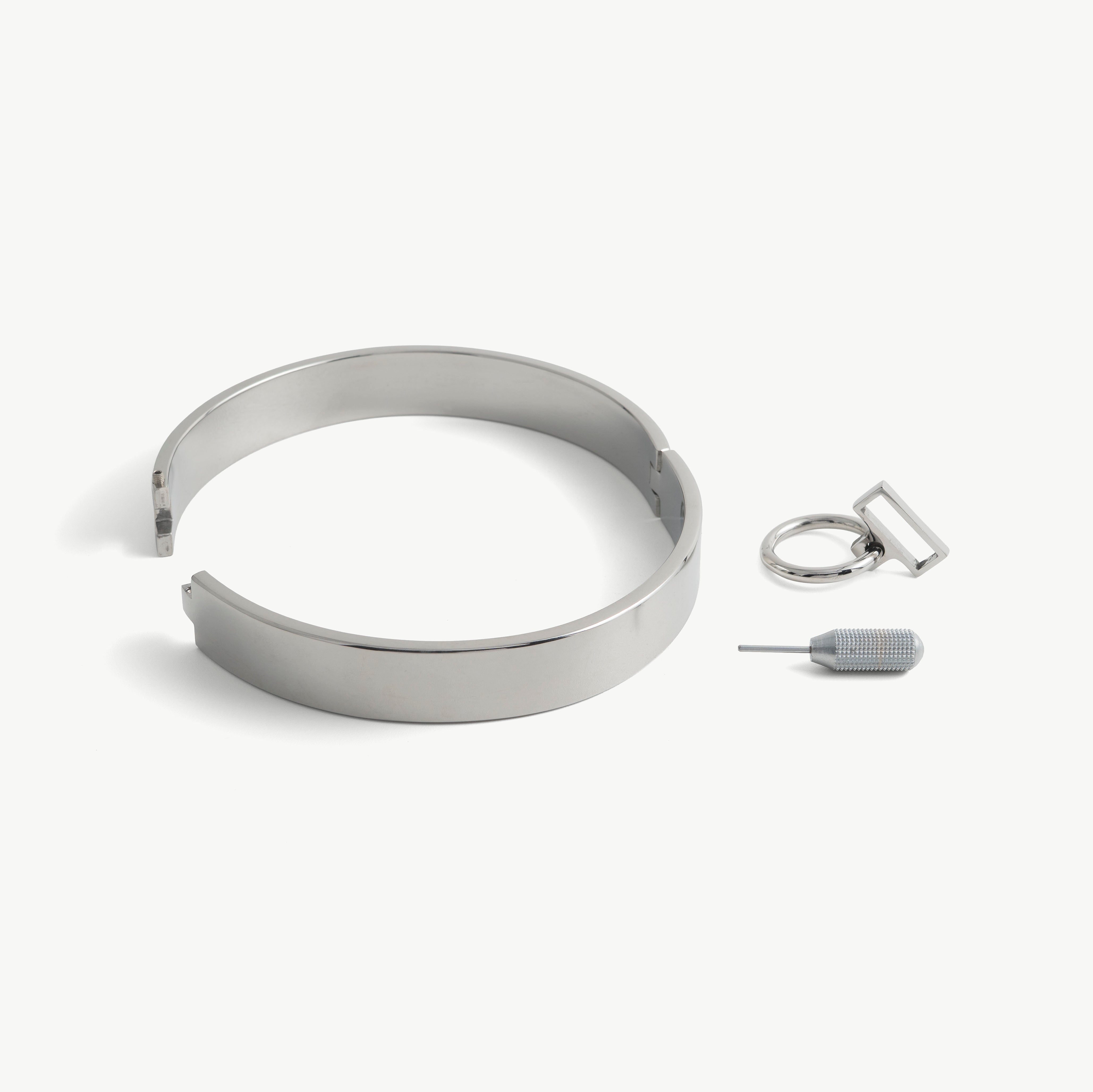deSade silver flat collar shown open beside its hex key tool
