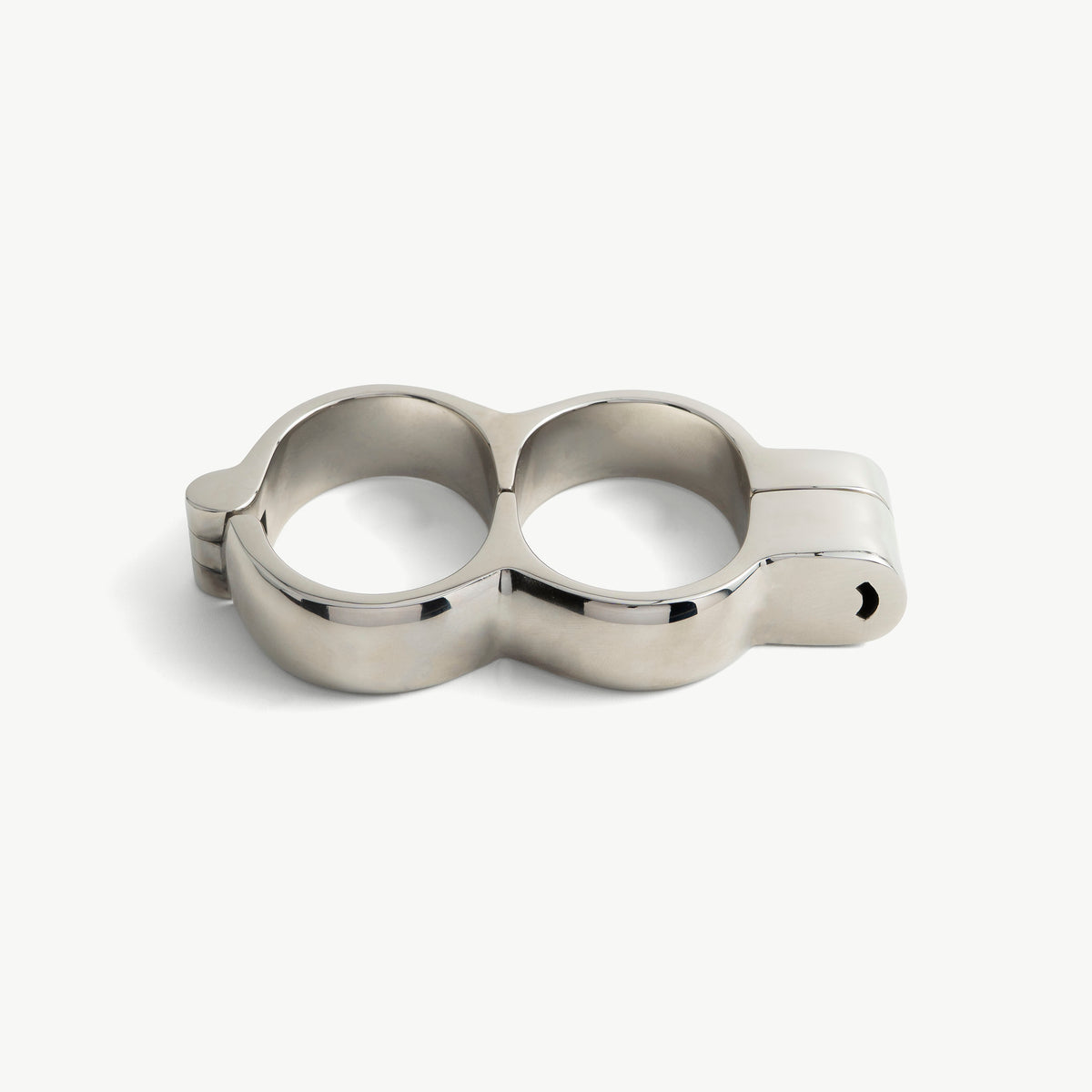 Polished steel Irish 8 handcuffs seen from the front, closed with keyhole visible