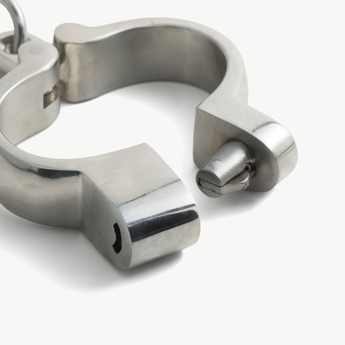 Close-up of the open Hamburg-8 cuff showing the click closure bolt and keyhole