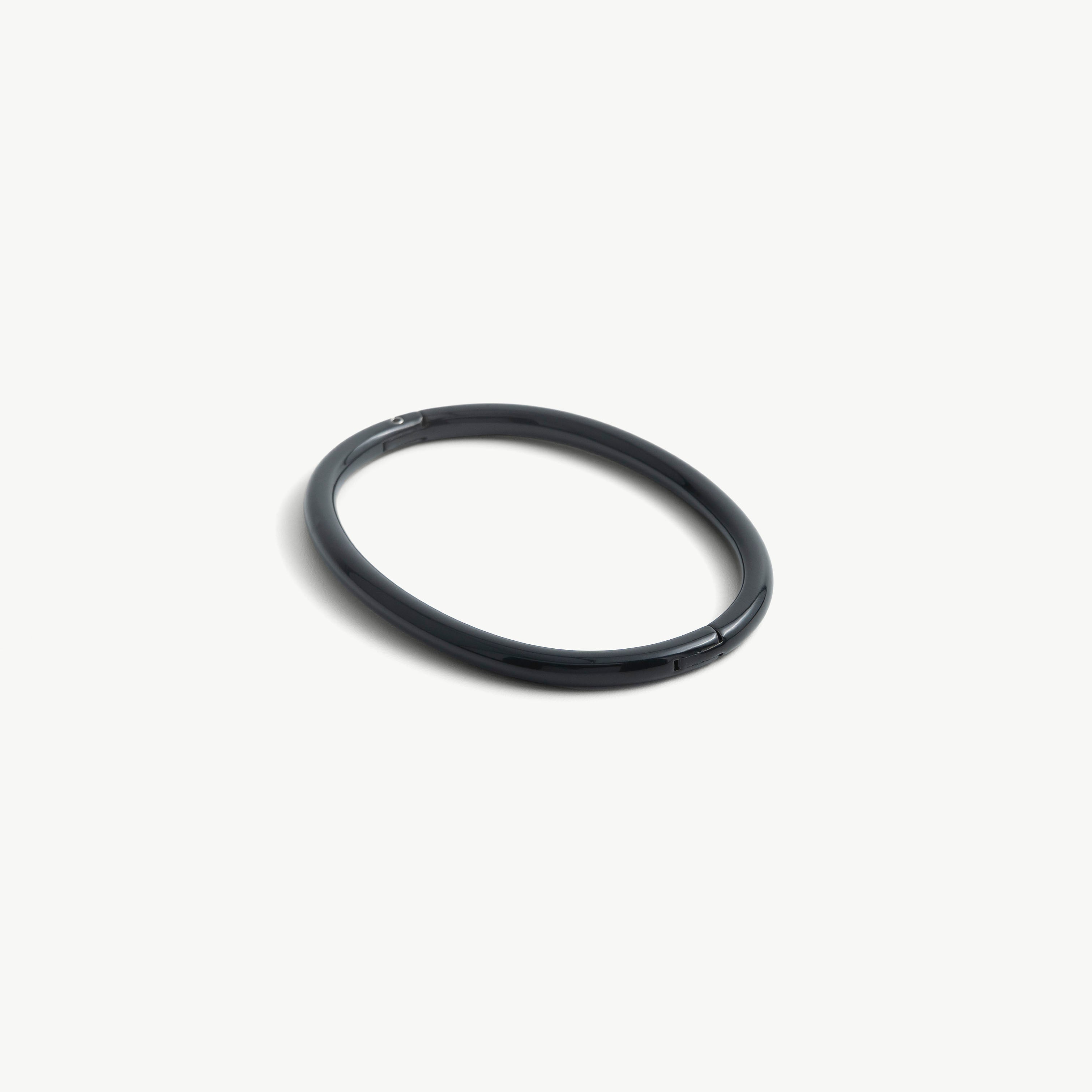 Age of Bondage deSade black ankle bracelet, smooth oval band with hidden hex lock, 6mm steel