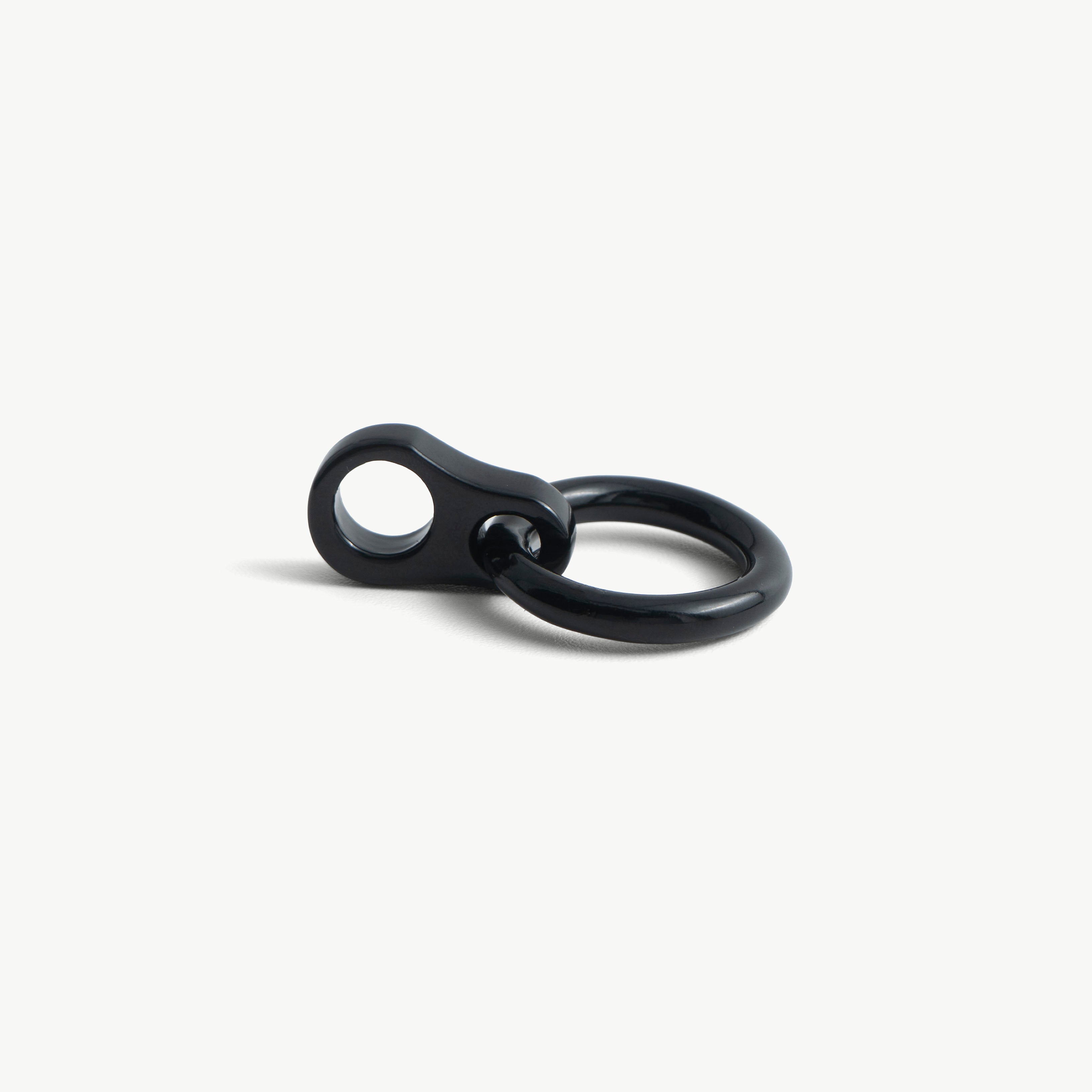 Another close-up of a single black O-ring pendant and its slide-on loop
