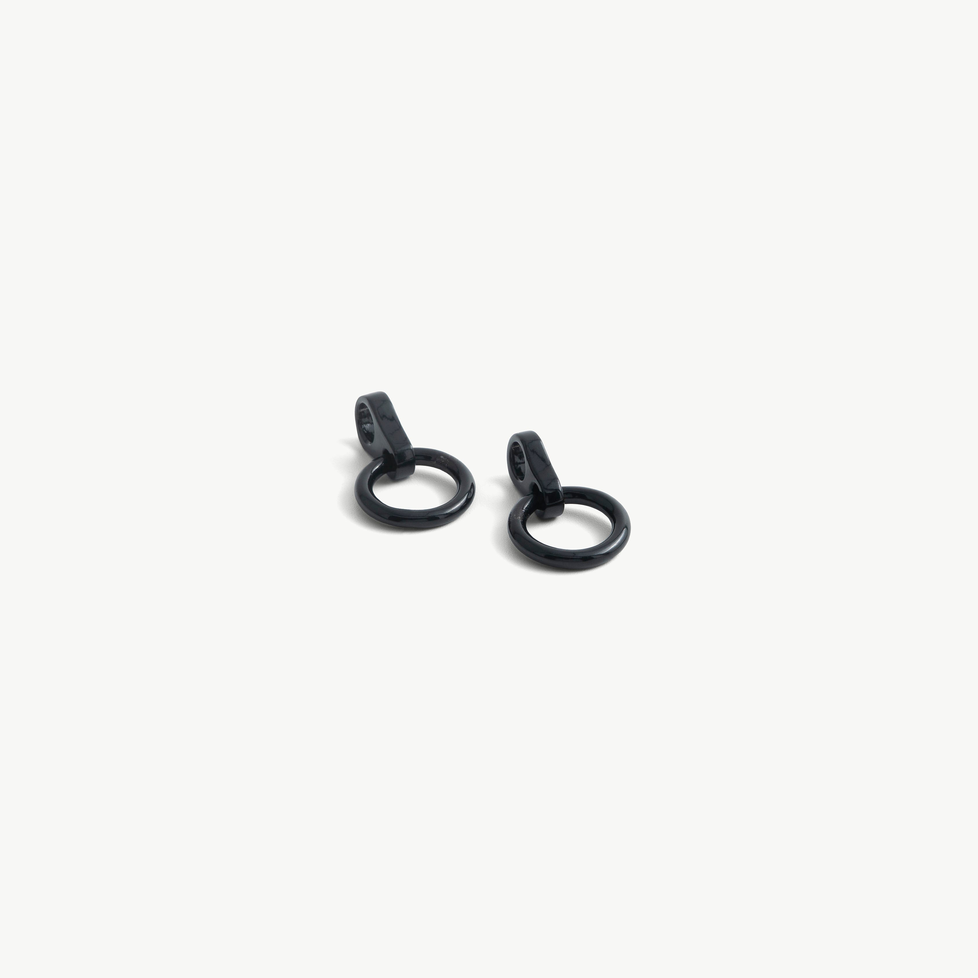 Age of Bondage pair of black O-ring pendants for deSade 8mm jewelry, each with a slide-on loop