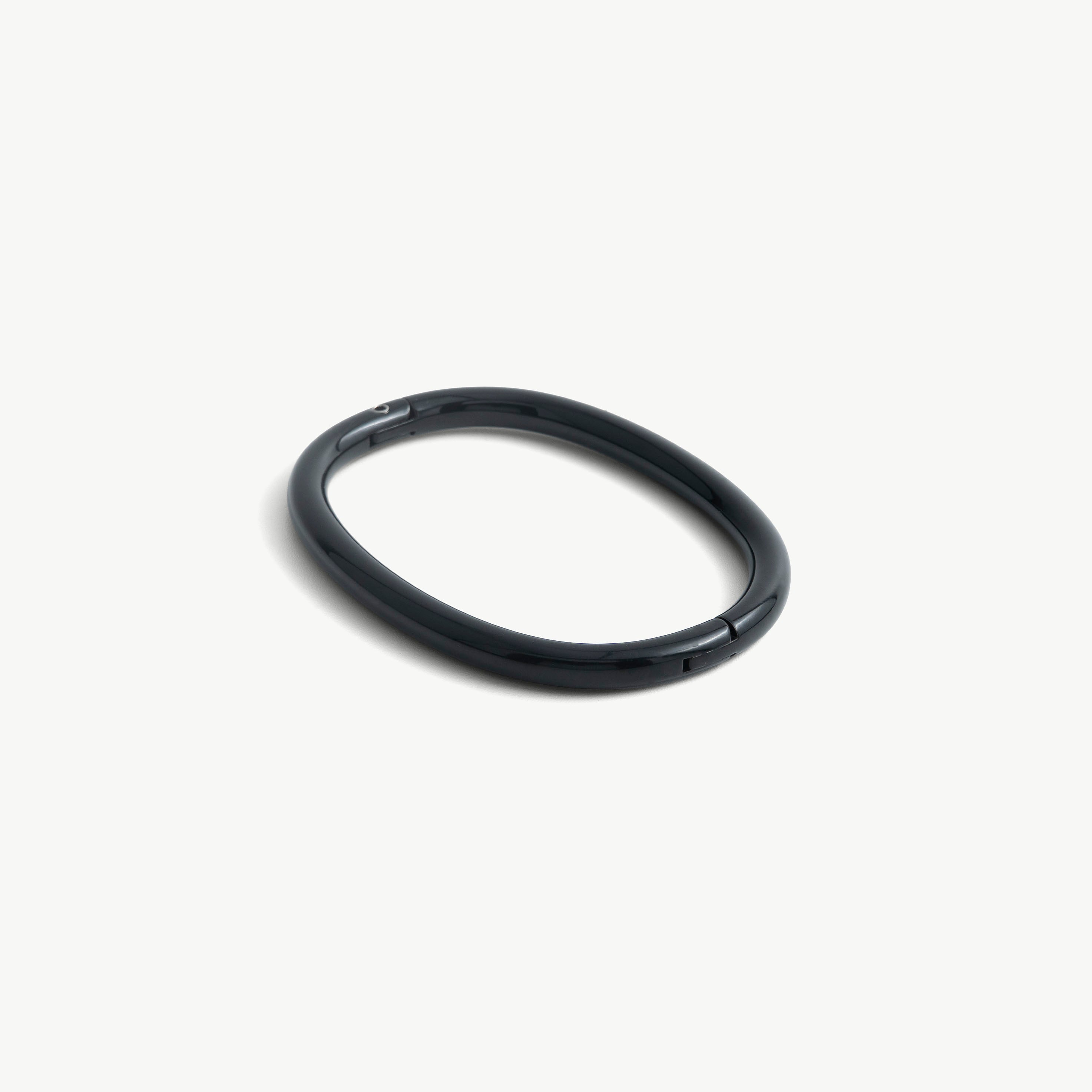 Age of Bondage deSade black ankle bracelet, smooth oval band with hidden hex lock, 8mm steel