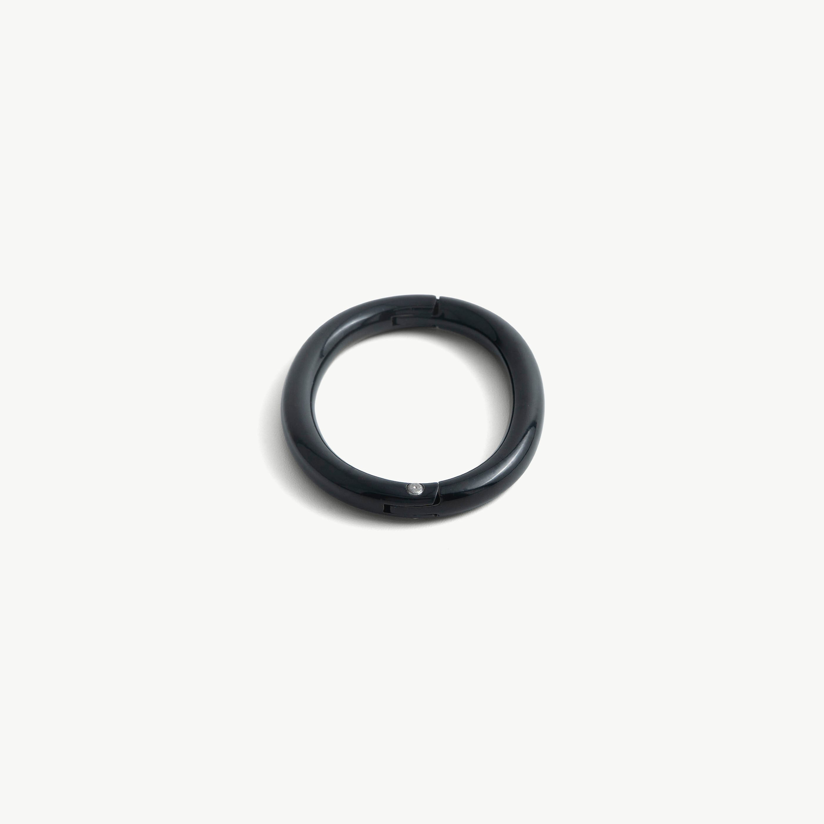 deSade black wrist bracelet seen from the front with the seamless hidden hex lock