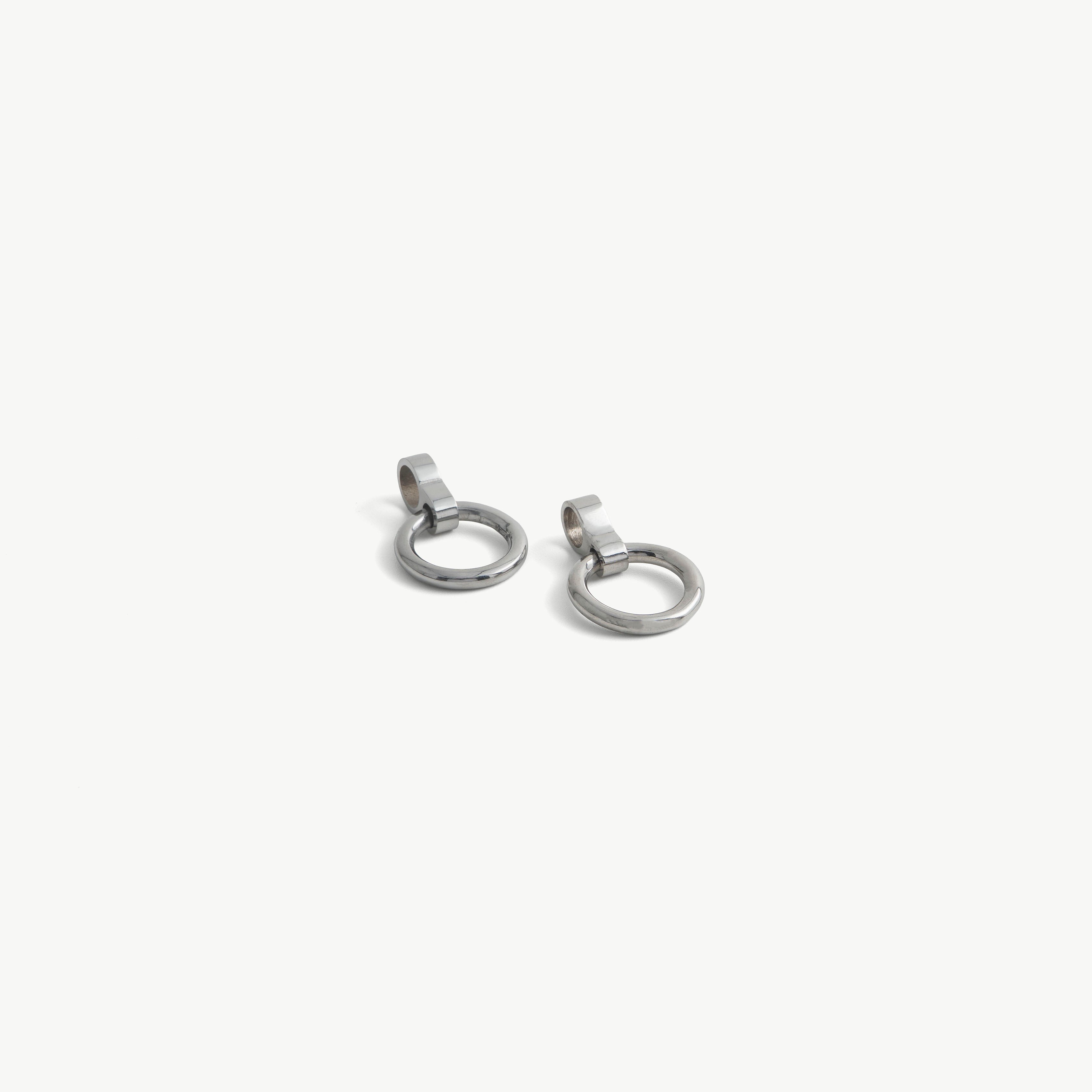 Age of Bondage pair of silver O-ring pendants for deSade 8mm jewelry, each with a slide-on loop