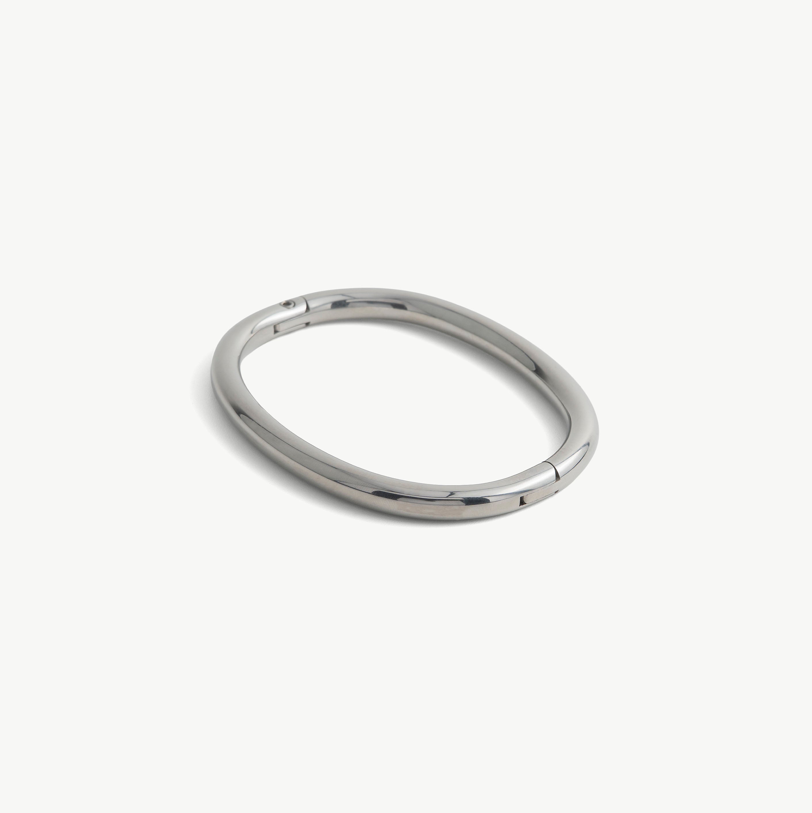 Age of Bondage deSade silver ankle bracelet, smooth oval band with hidden hex lock, 8mm steel