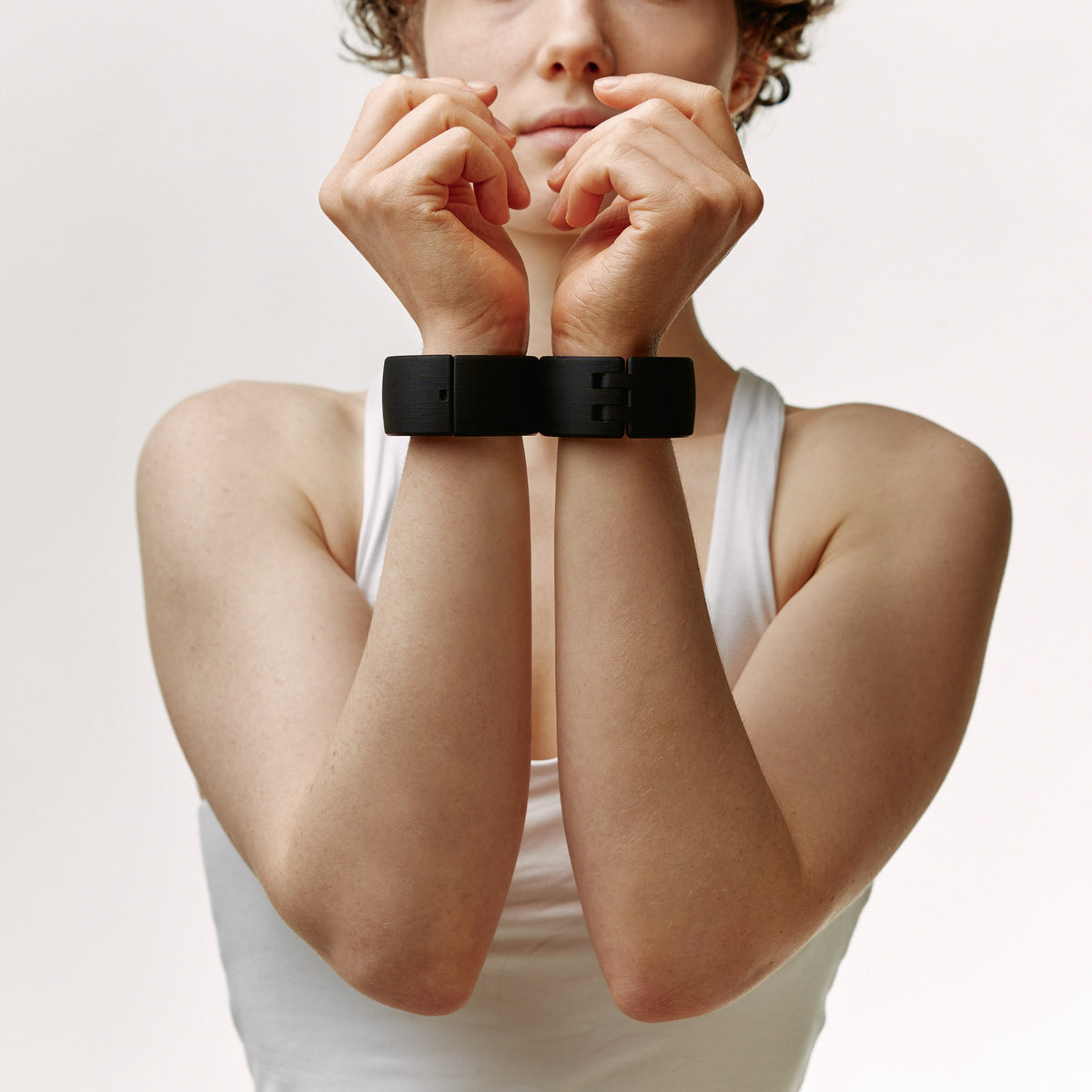 Black Quick Cuffs Adapt worn on both wrists in front, connected directly together