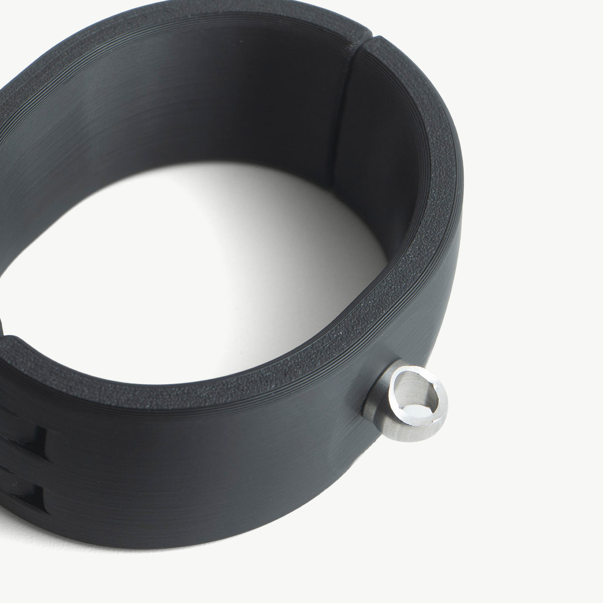Close-up of a black Quick Cuffs Adapt cuff with a fitted connector loop