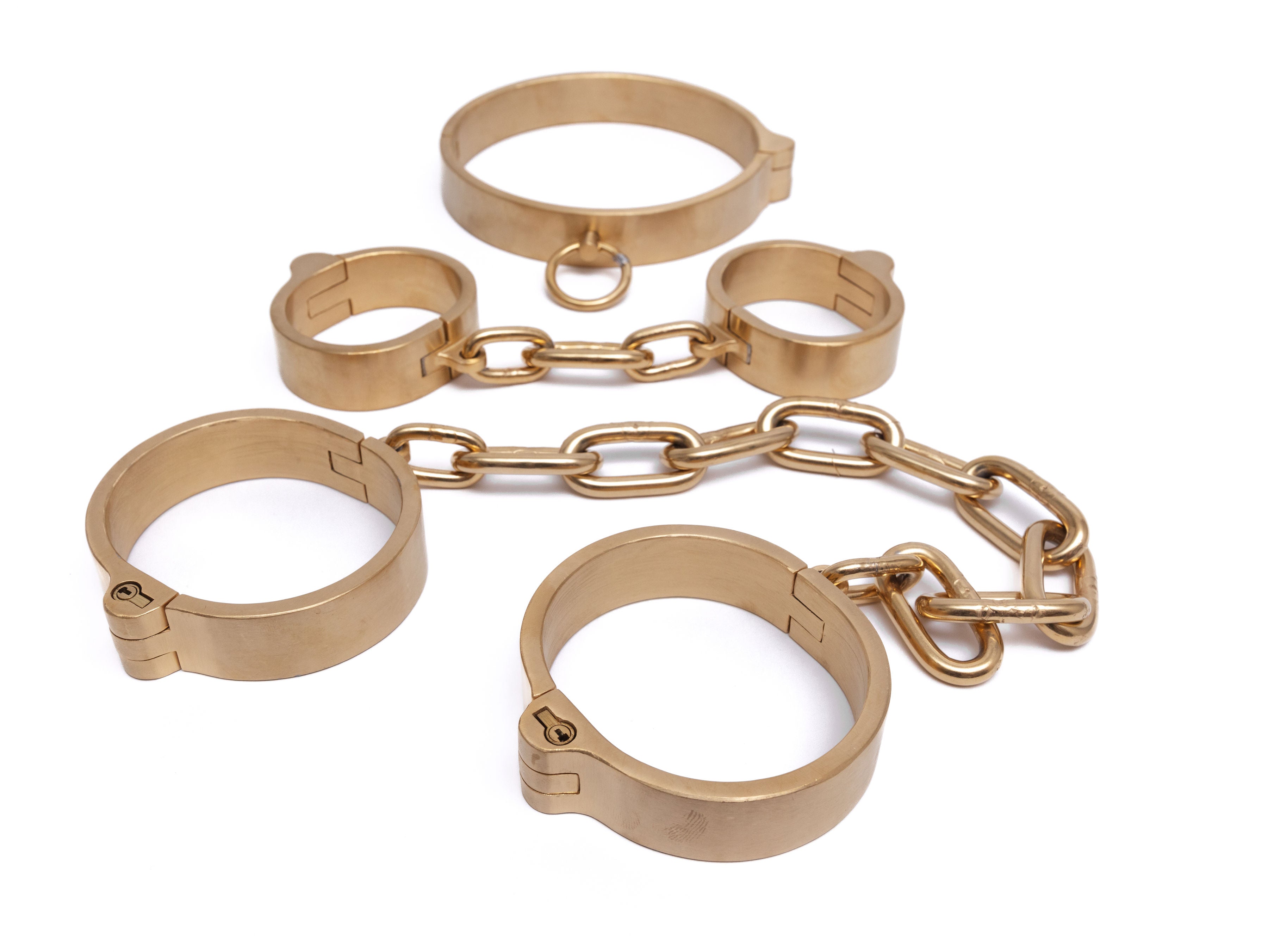 Gold push-in lock cuff shown with its lock cylinder