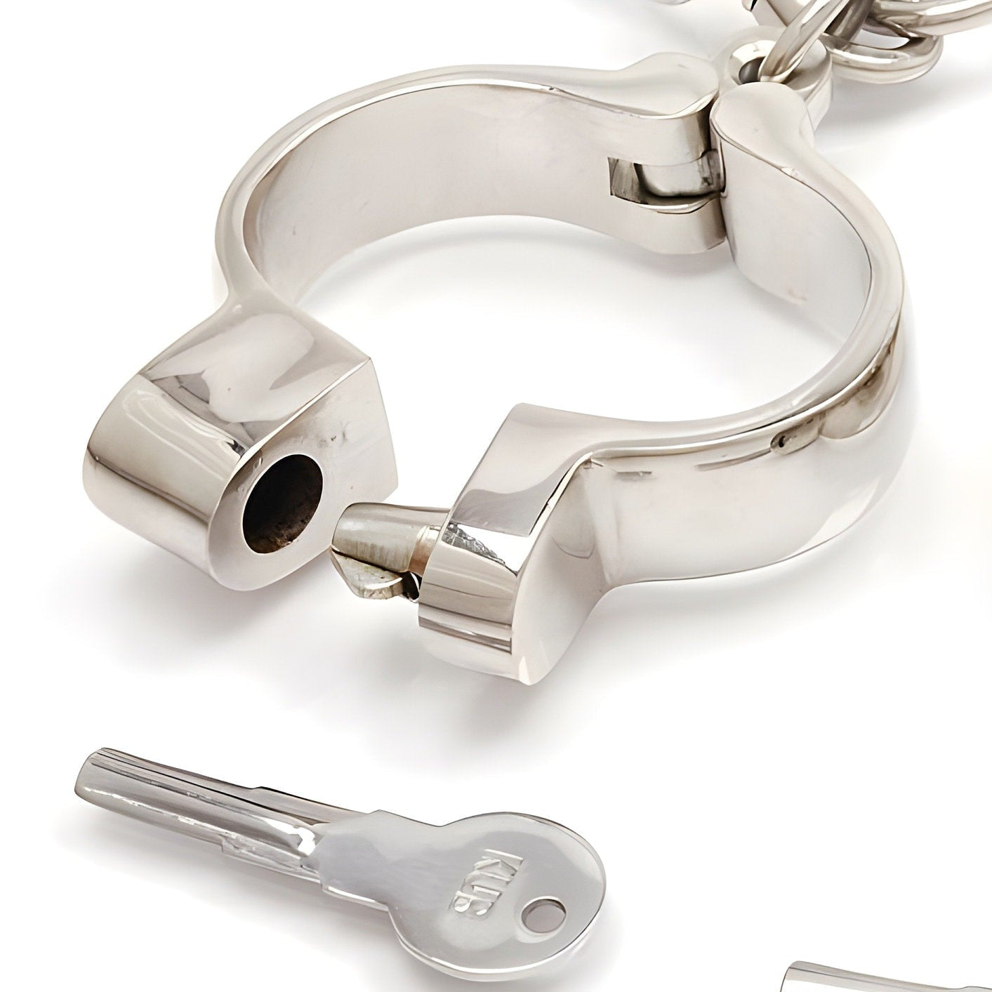 Heavy hand and leg irons with connecting chain