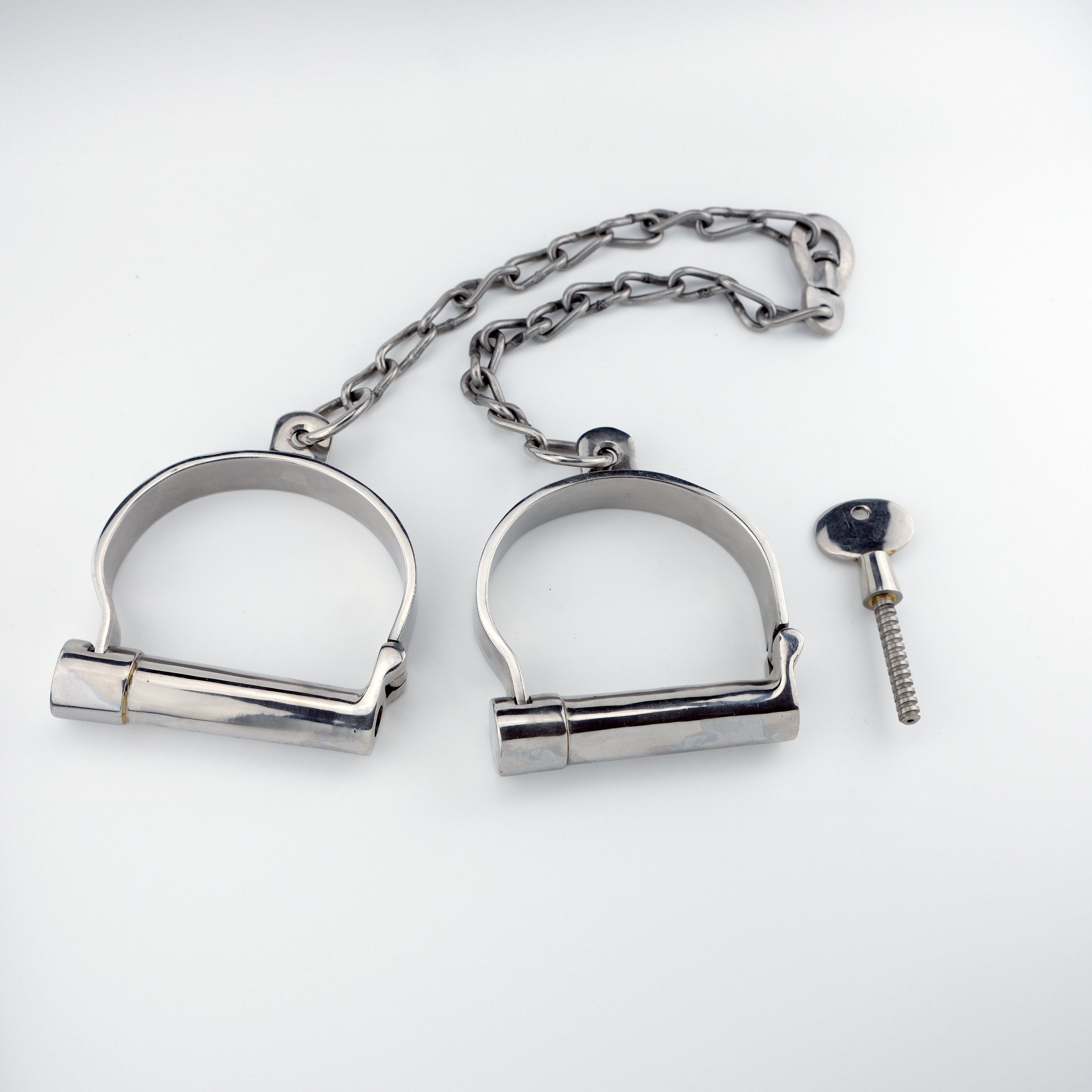 Heavy darby style stainless steel leg irons with chain